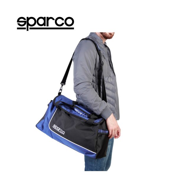 Sparco S6 Blue Travel Bag Picture9: Sparco S6 is a medium-size gym or travel bag with an adjustable and removable shoulder strap with a padded insert, two handles and more. The compact lightweight design has enough room to store your essentials featuring two handles, removable and adjustable shoulder strap with Sparco printed logo.
