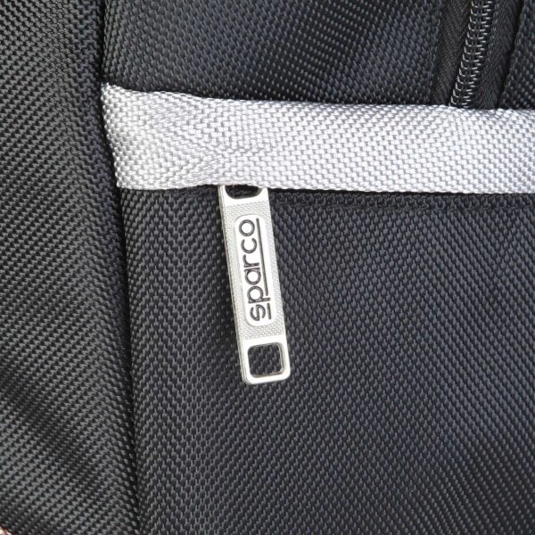 Sparco F12 Grey Backpack Bag Picture4: Sparco F12 is a medium-size backpack or travel bag with an adjustable shoulder straps, one padded compartment a top handle and more. The backpack has zipped closure with buckles and zipped side pockets. Sparco logo is printed at the front.